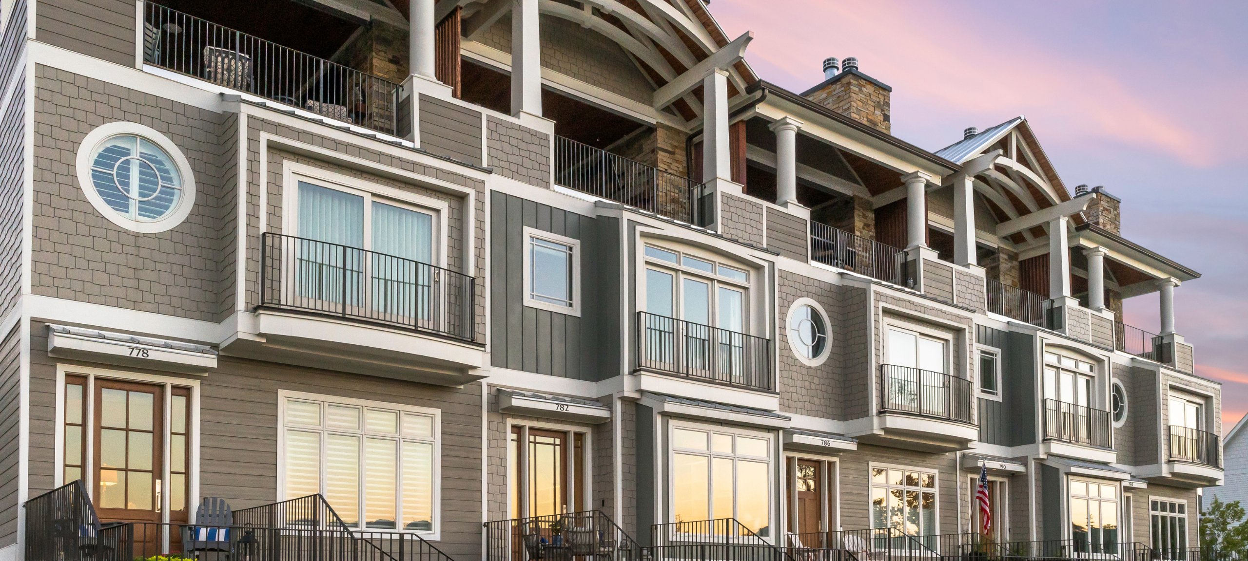A sunset photo of Cameron Harbor Luxury Townhomes in Chattanooga, TN